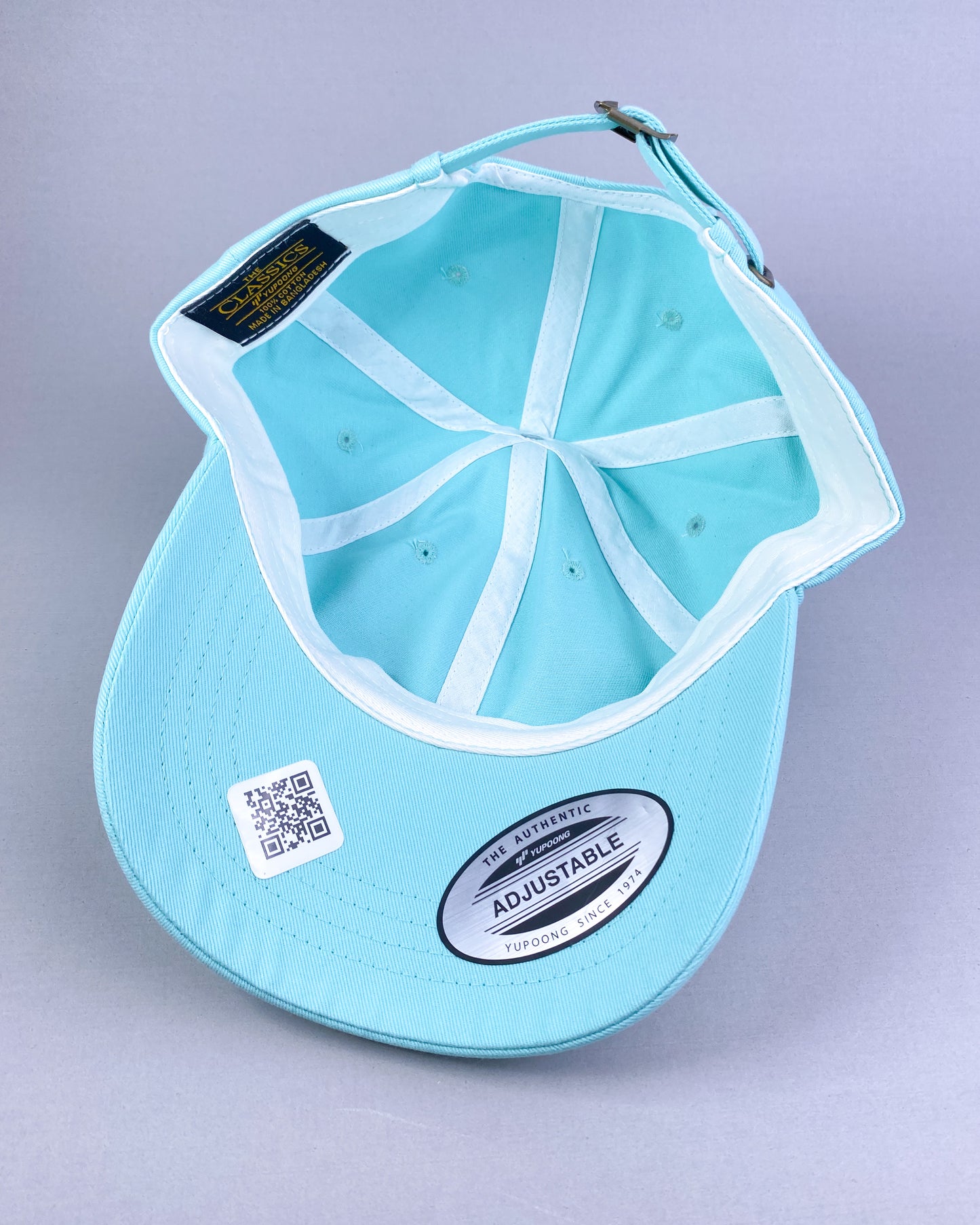 Bravo Premium hat in teal with marlin design leather patch
