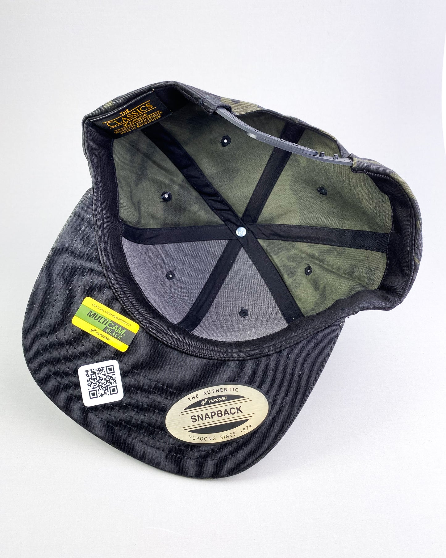 Bravo Premium hat in dark camo with distressed flag design leather patch